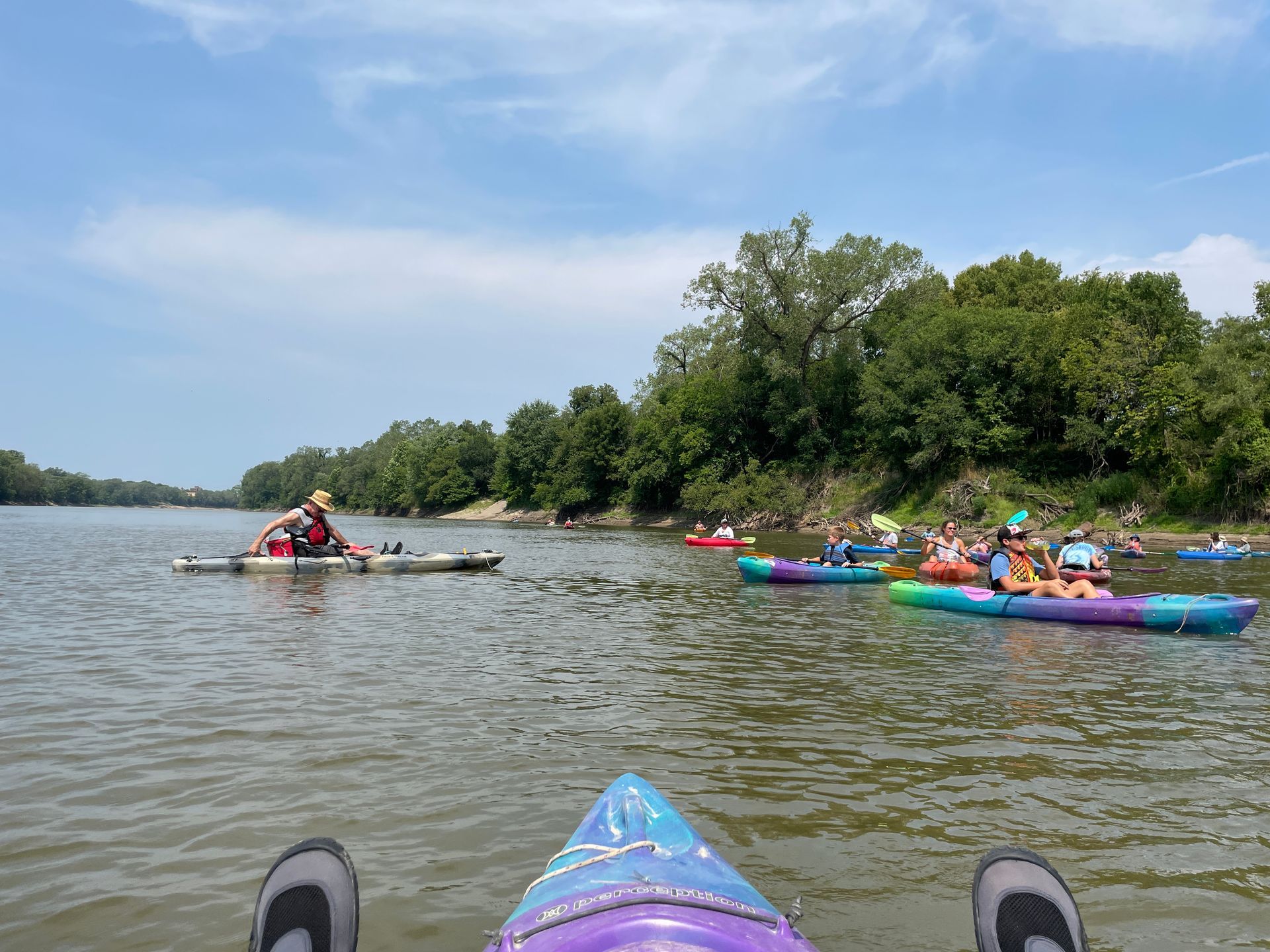 ICL employees are in their boats and floating down the river.