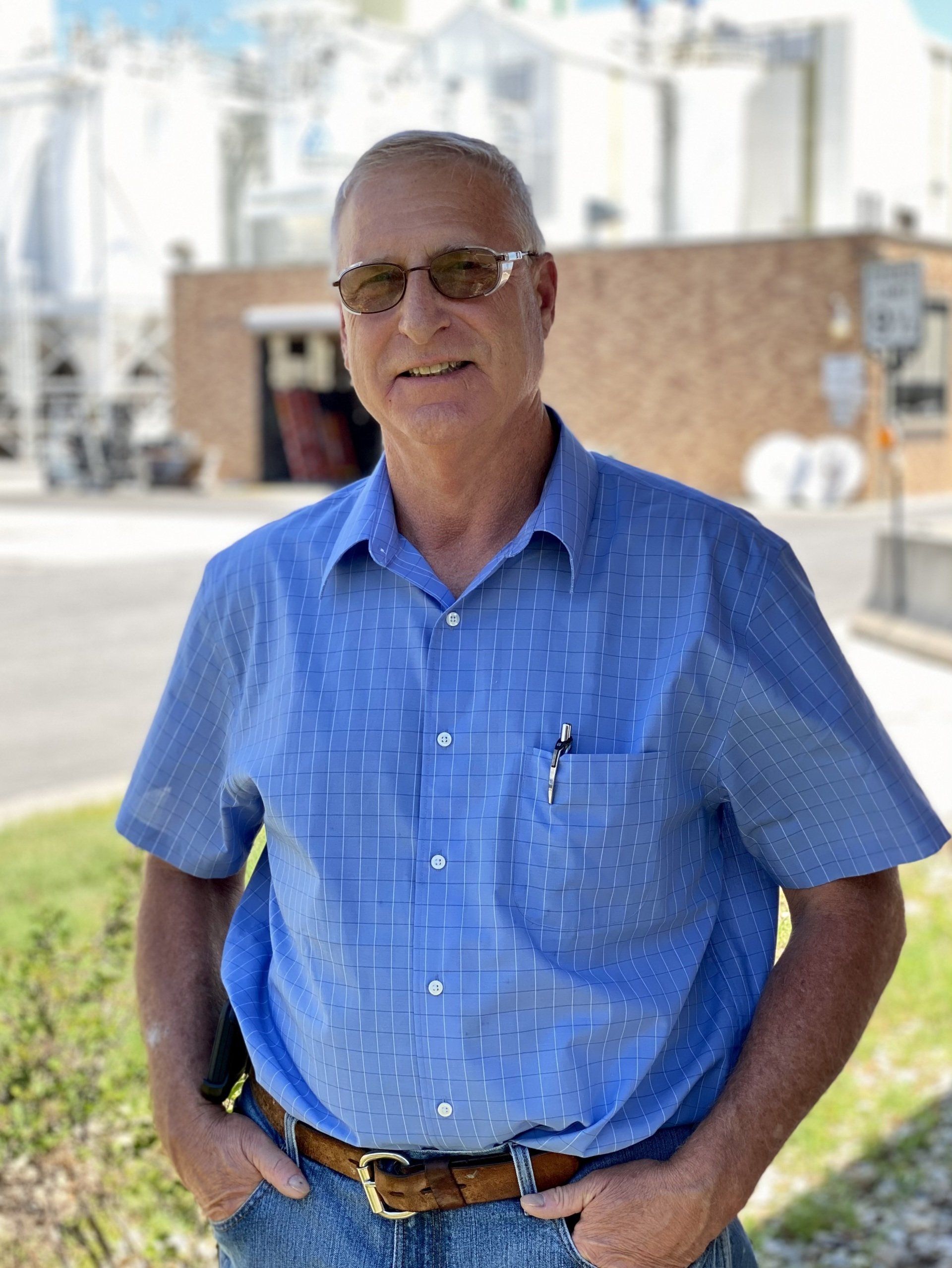 ICL employee smiles for the camera.