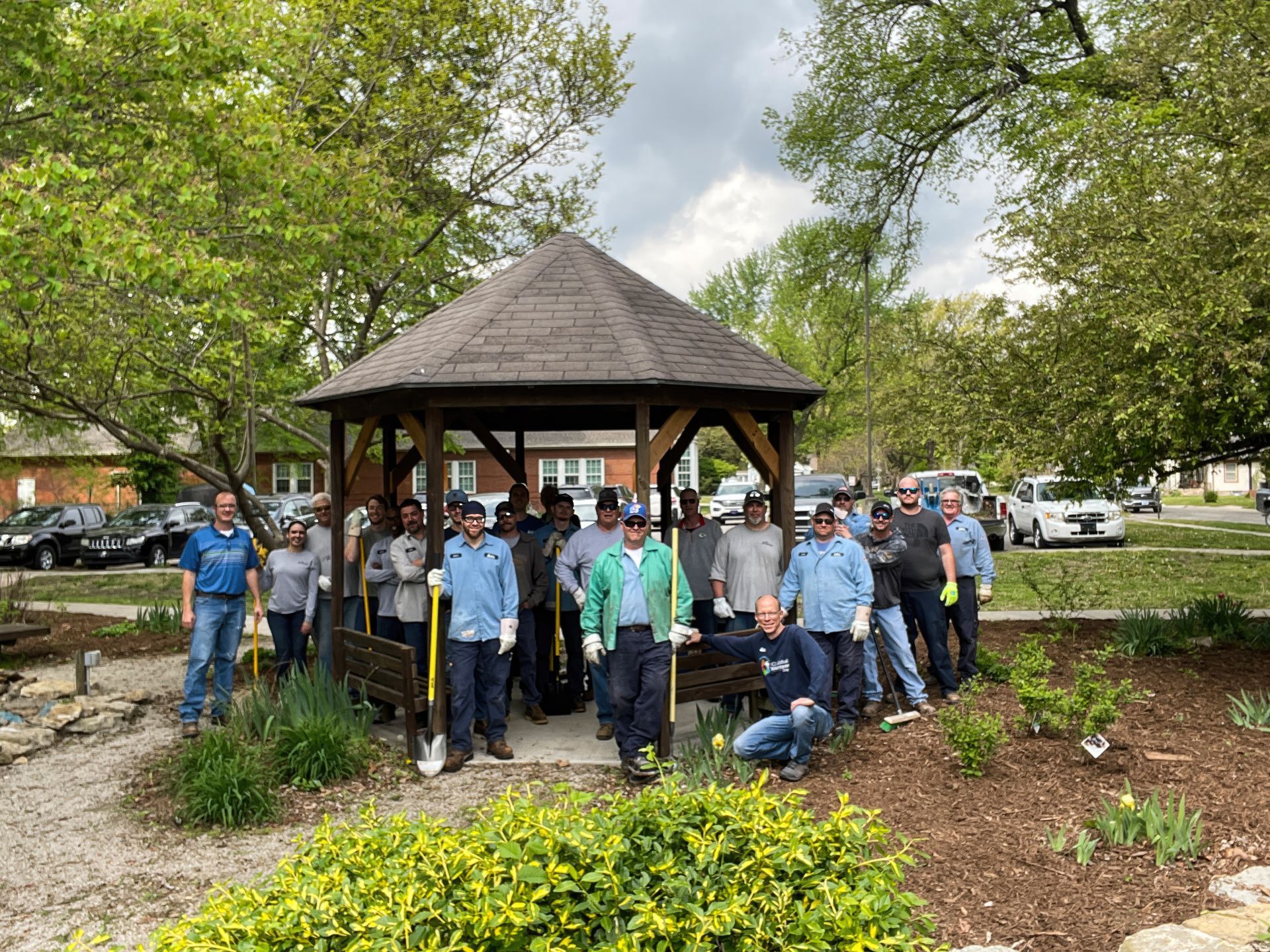 ICL employees pose for the camera at the Community Garden.