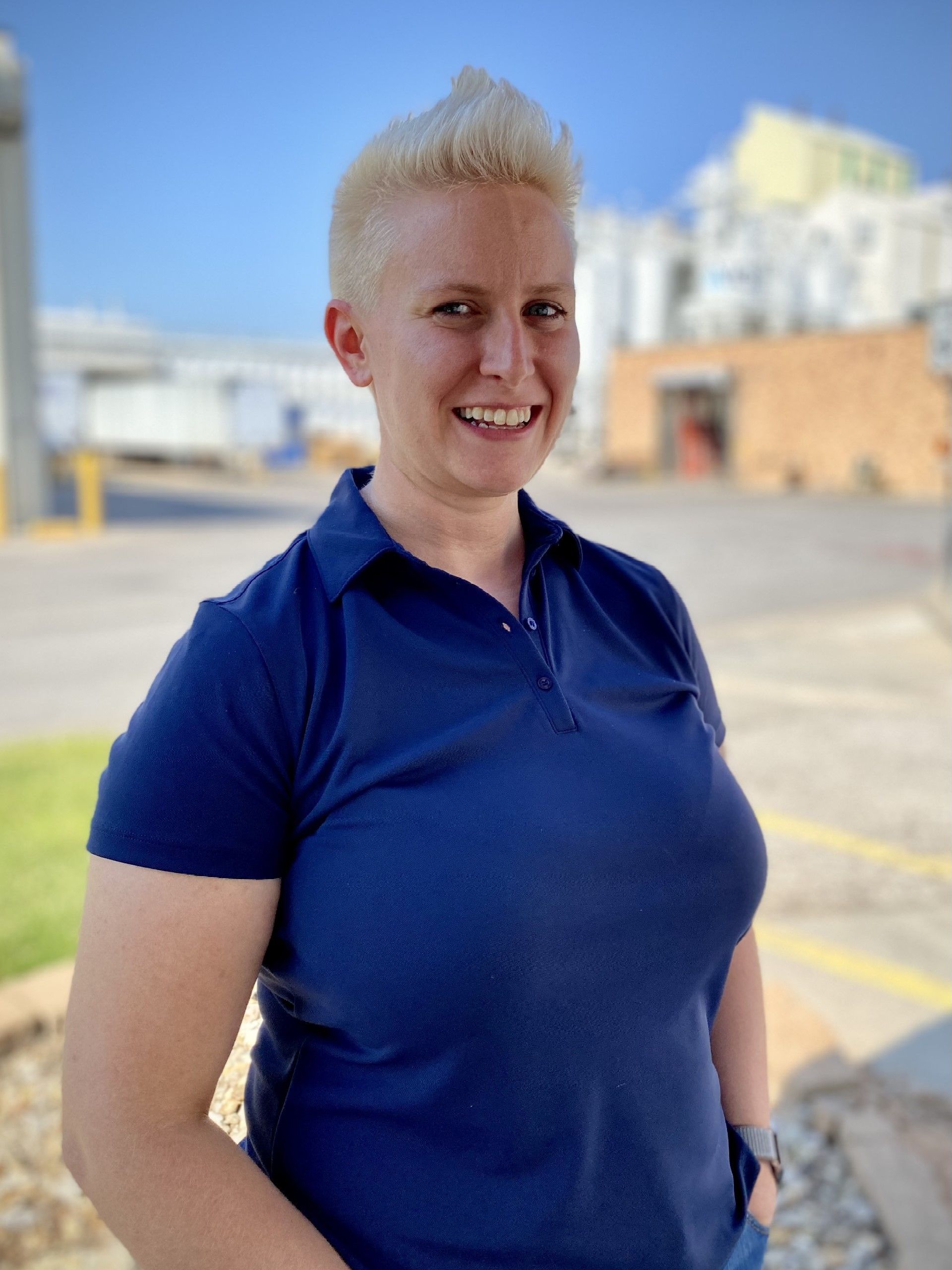 ICL employee smiles for the camera.
