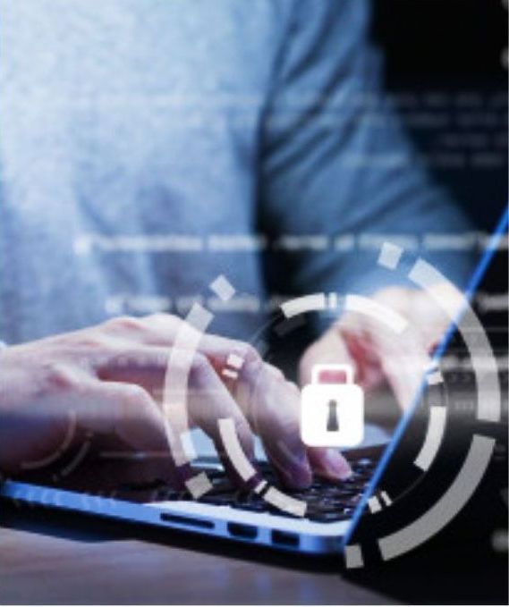 Person typing on a laptop with a security lock overlay, suggesting data protection.