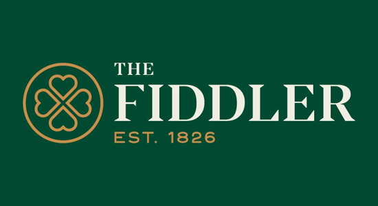 Logo for The Fiddler, a pub. Green background with shamrock emblem in a circle and the text 