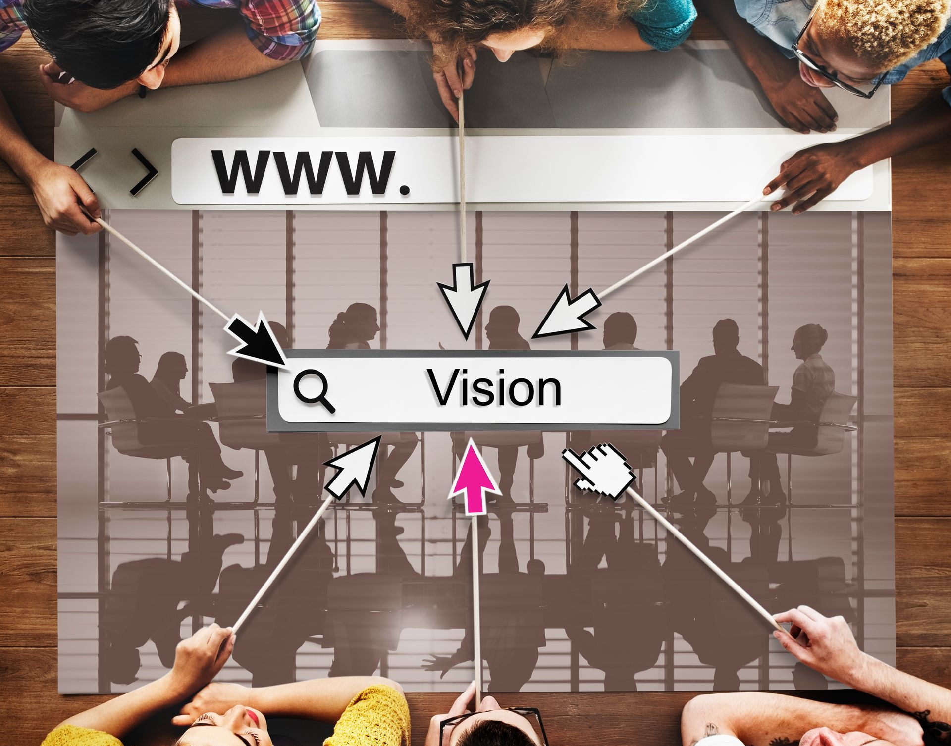 Hände, die ein Blatt Papier umschliessen, auf dem eine Suchleiste im Internet mit dem Wort „Vision“ zu sehen ist, auf die mehrere Cursor zeigen.