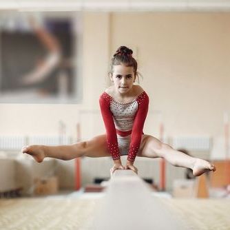 girl performing gymnastics