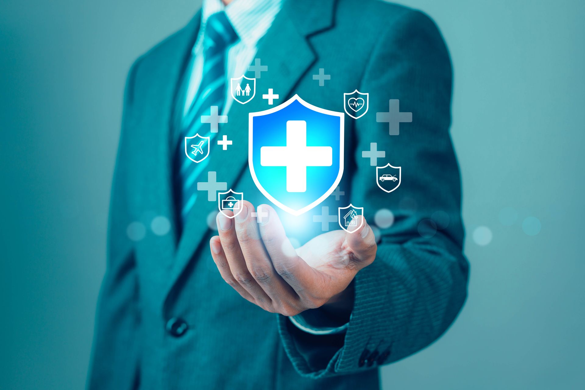 Technician holding glowing digital holograms with data icons in a blue futuristic network background