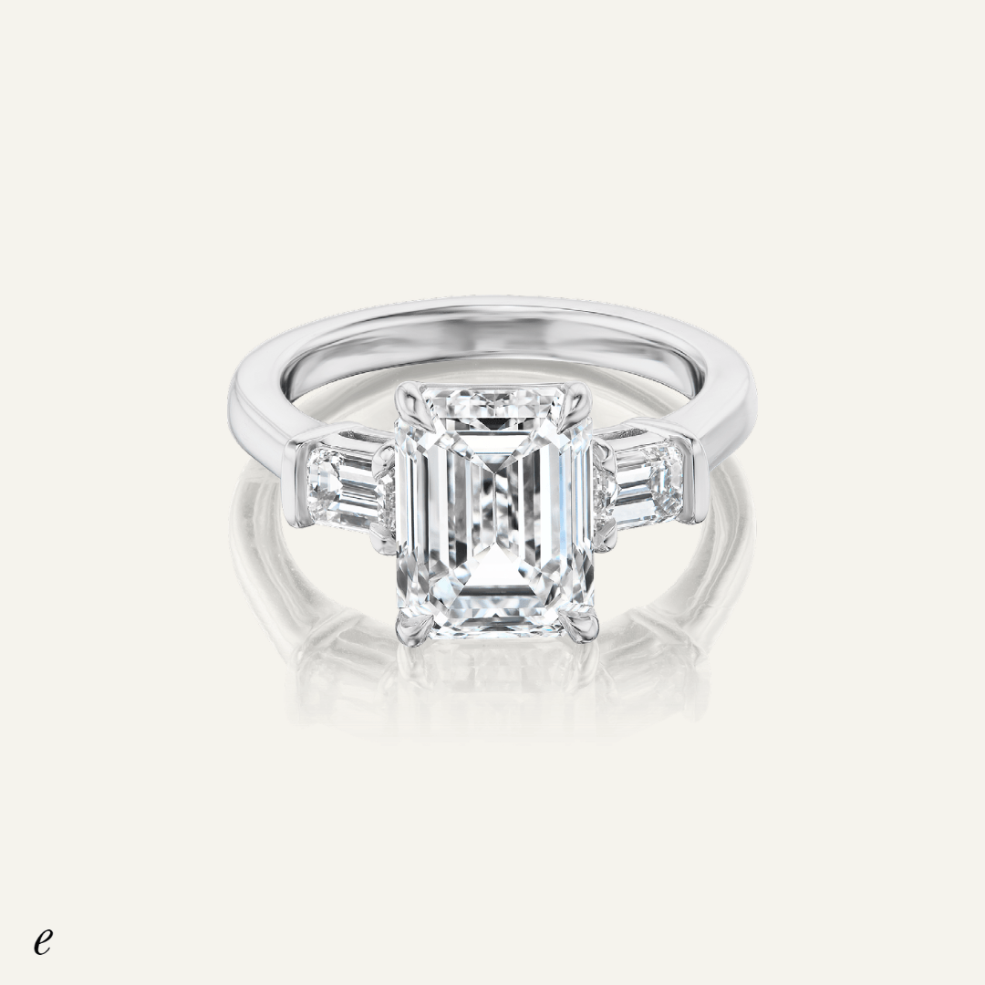 3.20ct Emerald cut diamond with .86cts tw matching sides
