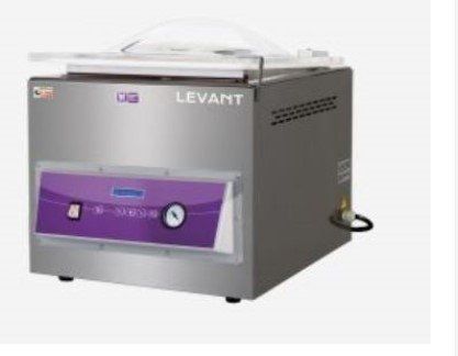 Lavatrice da banco LEVANT di colore grigio e viola con coperchio a cupola trasparente e pannello di controllo frontale.