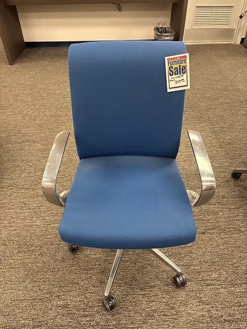 Blue office chair with chrome arms and base; on sale.