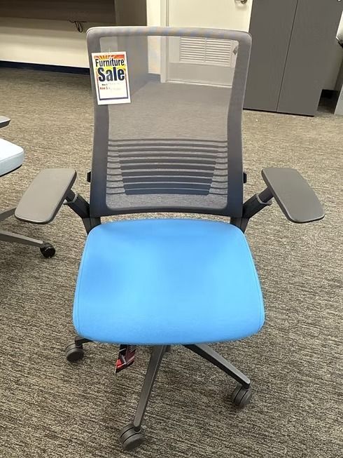 Blue and gray office chair on sale. Mesh back, blue seat, and gray armrests.