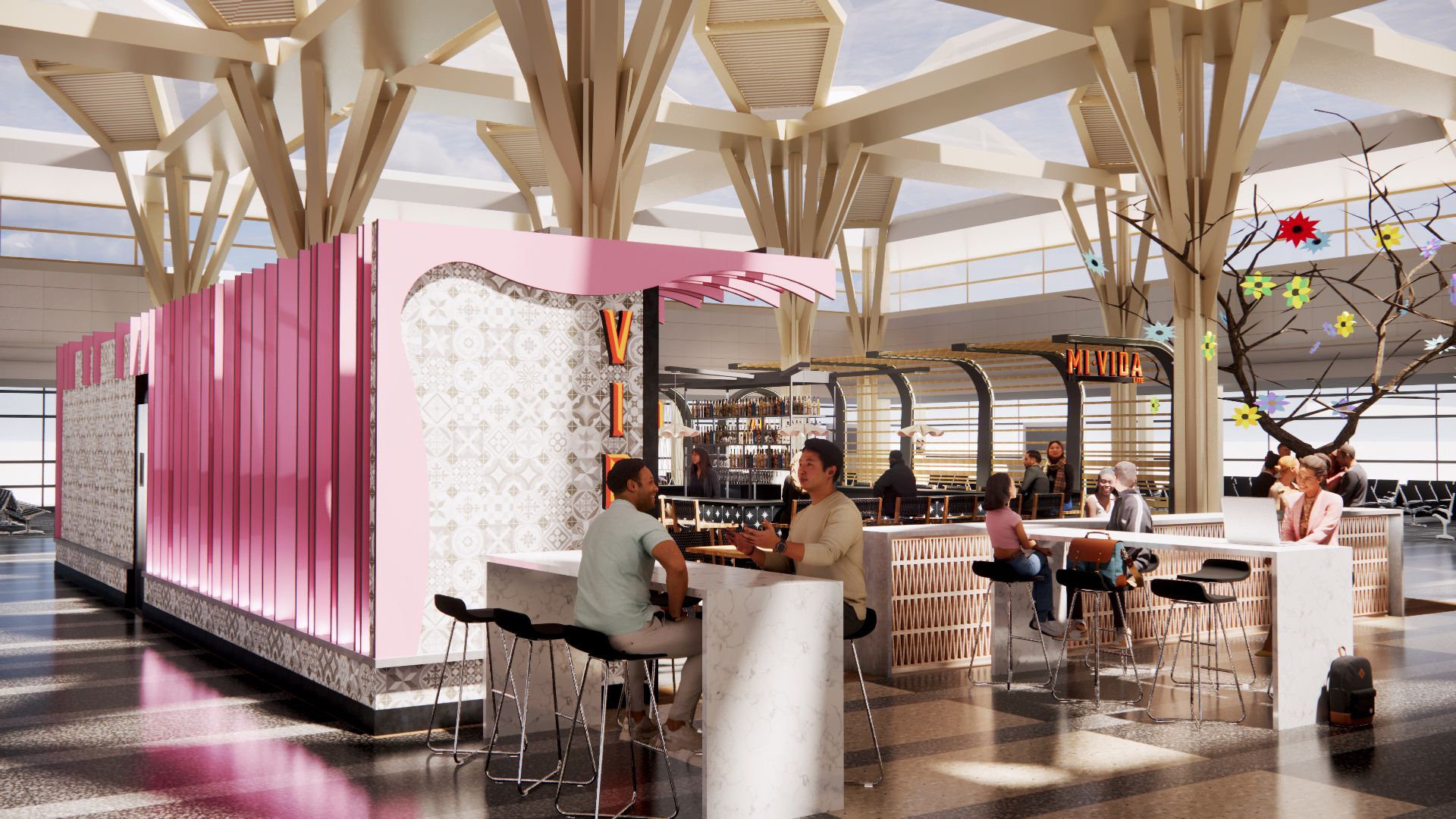 A group of people are sitting at tables in a restaurant.