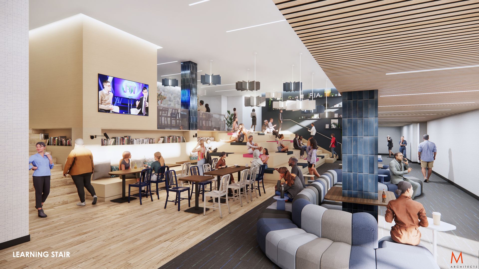 Modern lounge with seating areas, tables, steps, and a large screen. People sit and stand, socializing in the space.