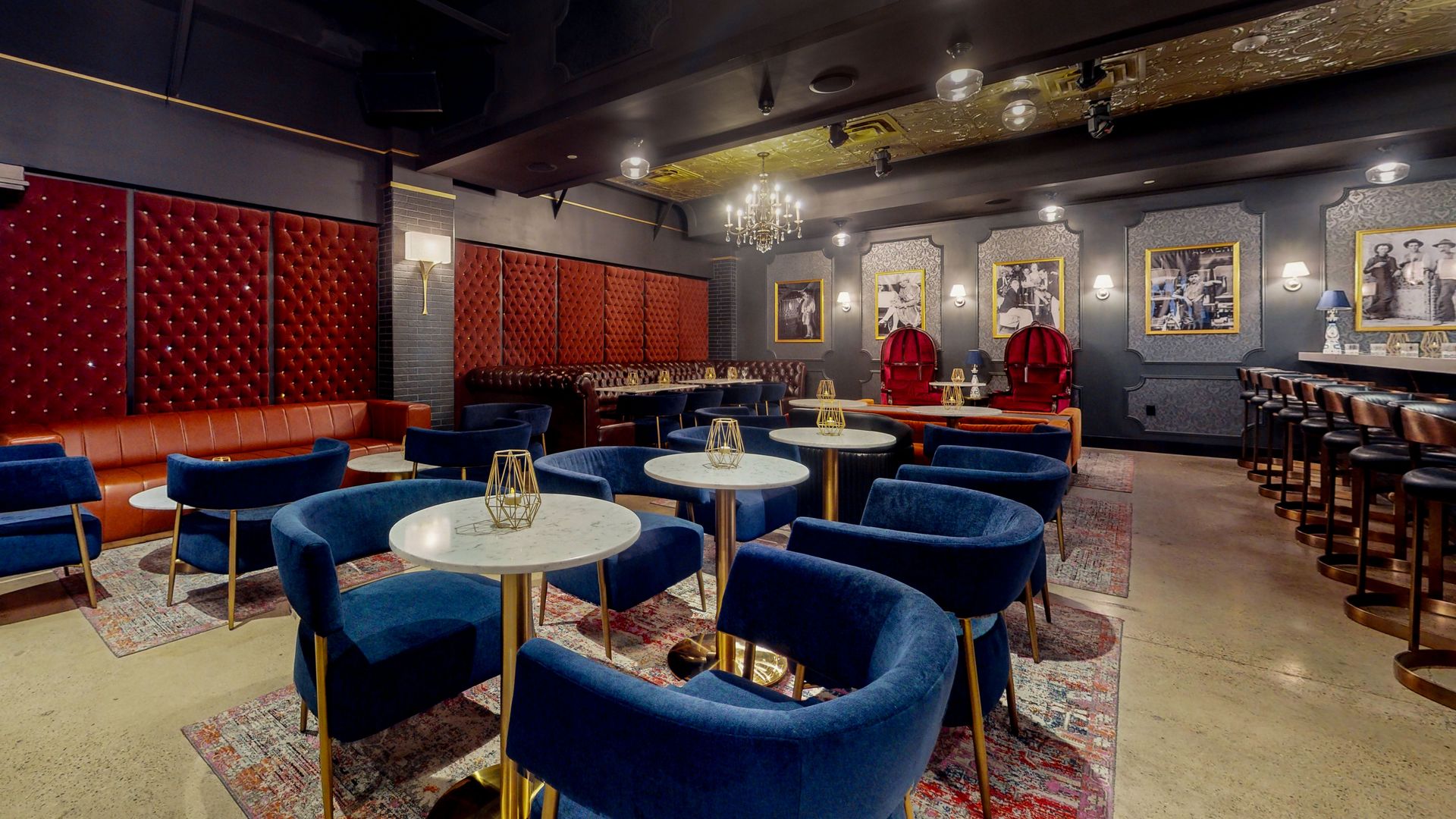 a large room filled with tables and chairs in a restaurant .