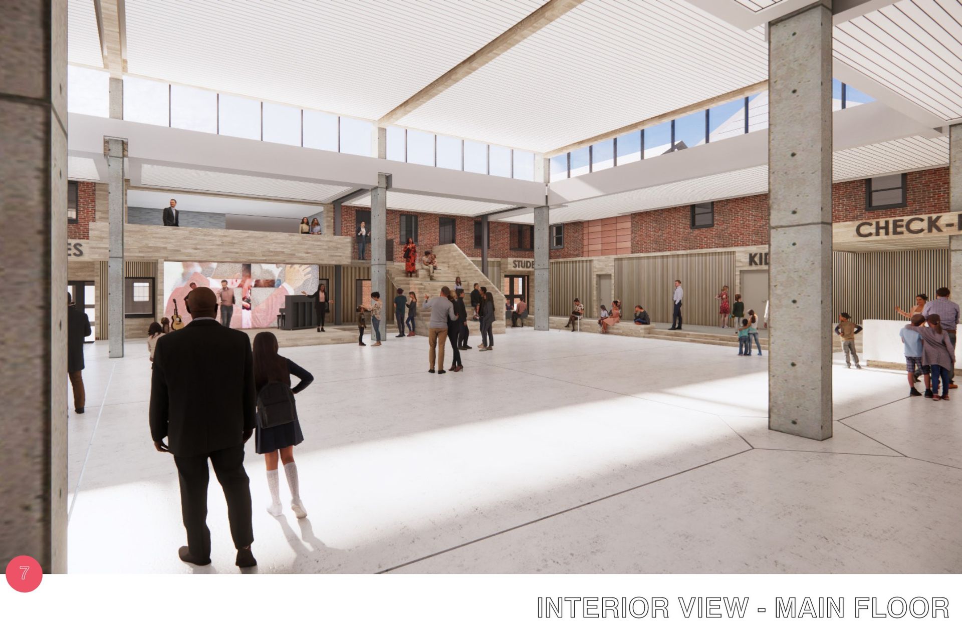 Interior view of a large open space with people. White floors and high ceilings, brick walls, and concrete pillars.