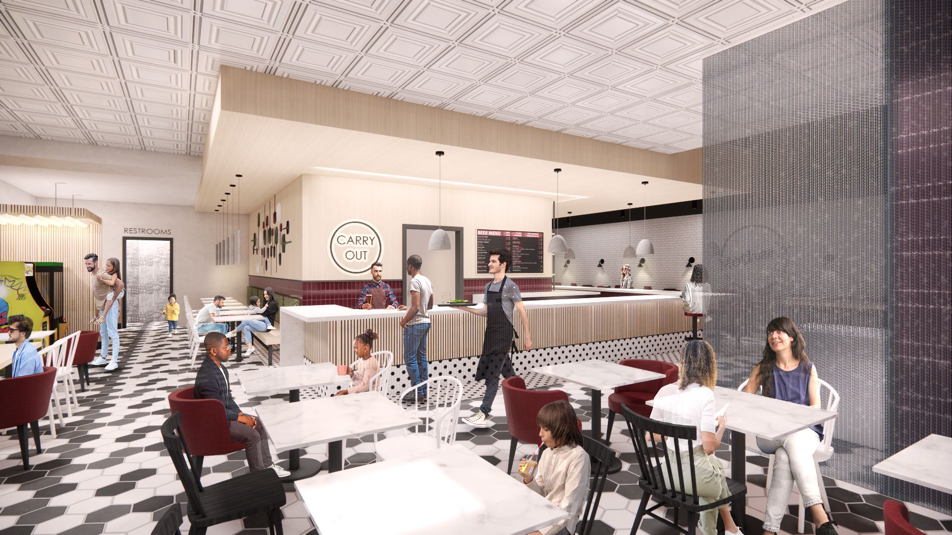 A group of people are sitting at tables in a restaurant.