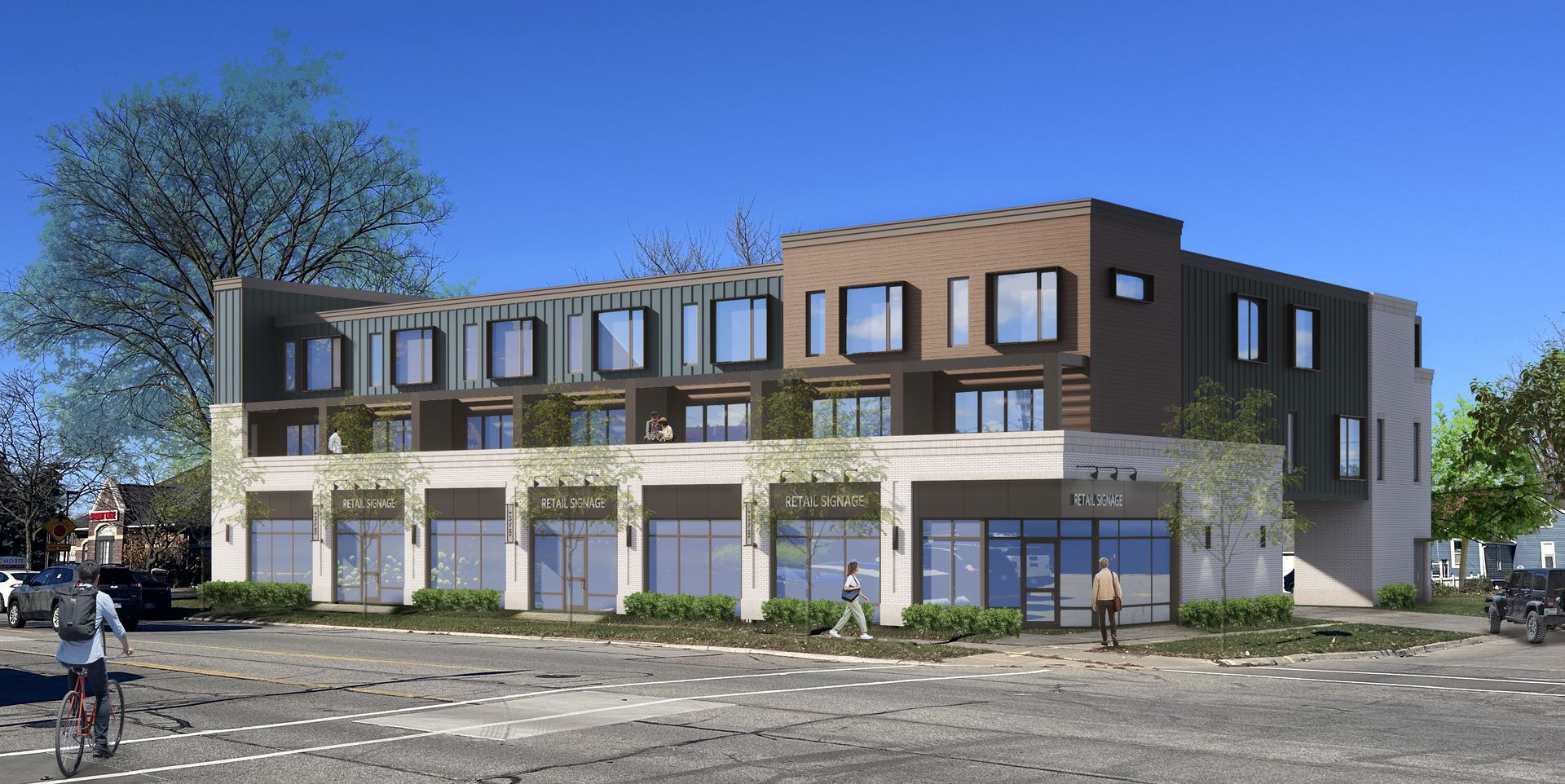 Modern building with storefronts on the ground floor and residences above, on a sunny day.