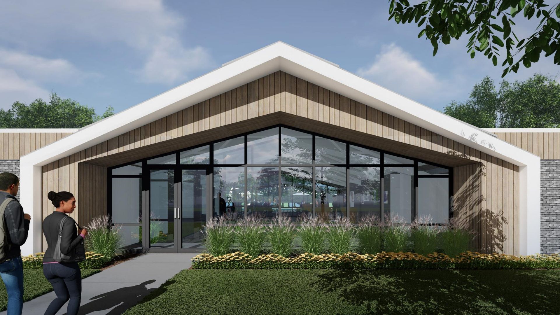 Exterior view of a modern building with glass doors, angled roof, and landscaping. People walking toward the entrance.
