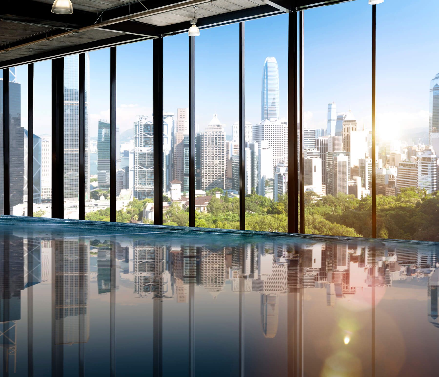 there is a large window with a view of the city .