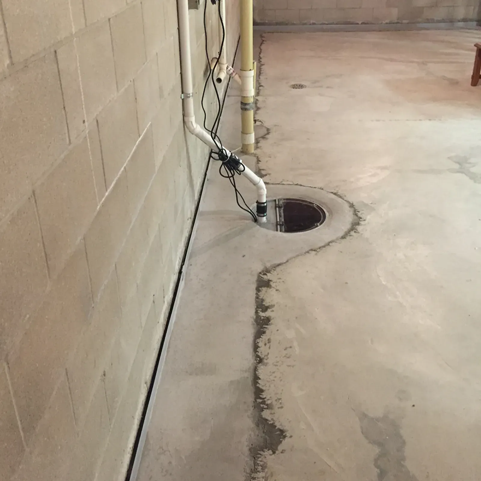 Basement sump pump and drainage system installation by Elite Basement Solutions