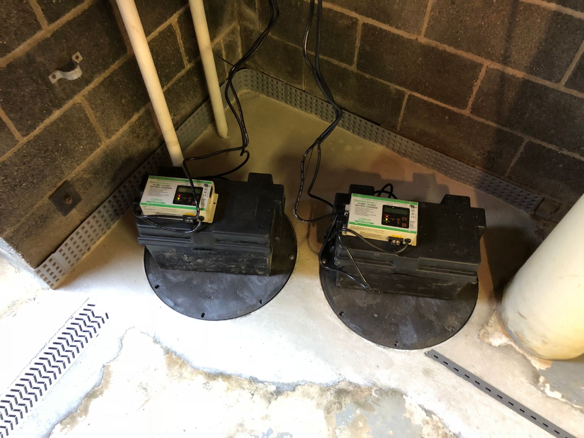 Basement vapor barrier with sump pump area by Elite Basement Solutions