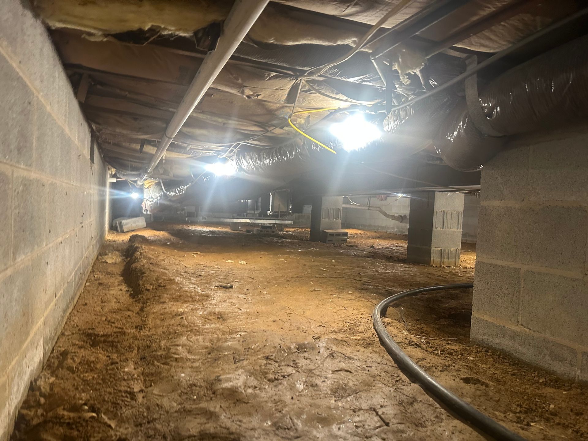 Crawl space before encapsulation by Elite Basement Solutions
