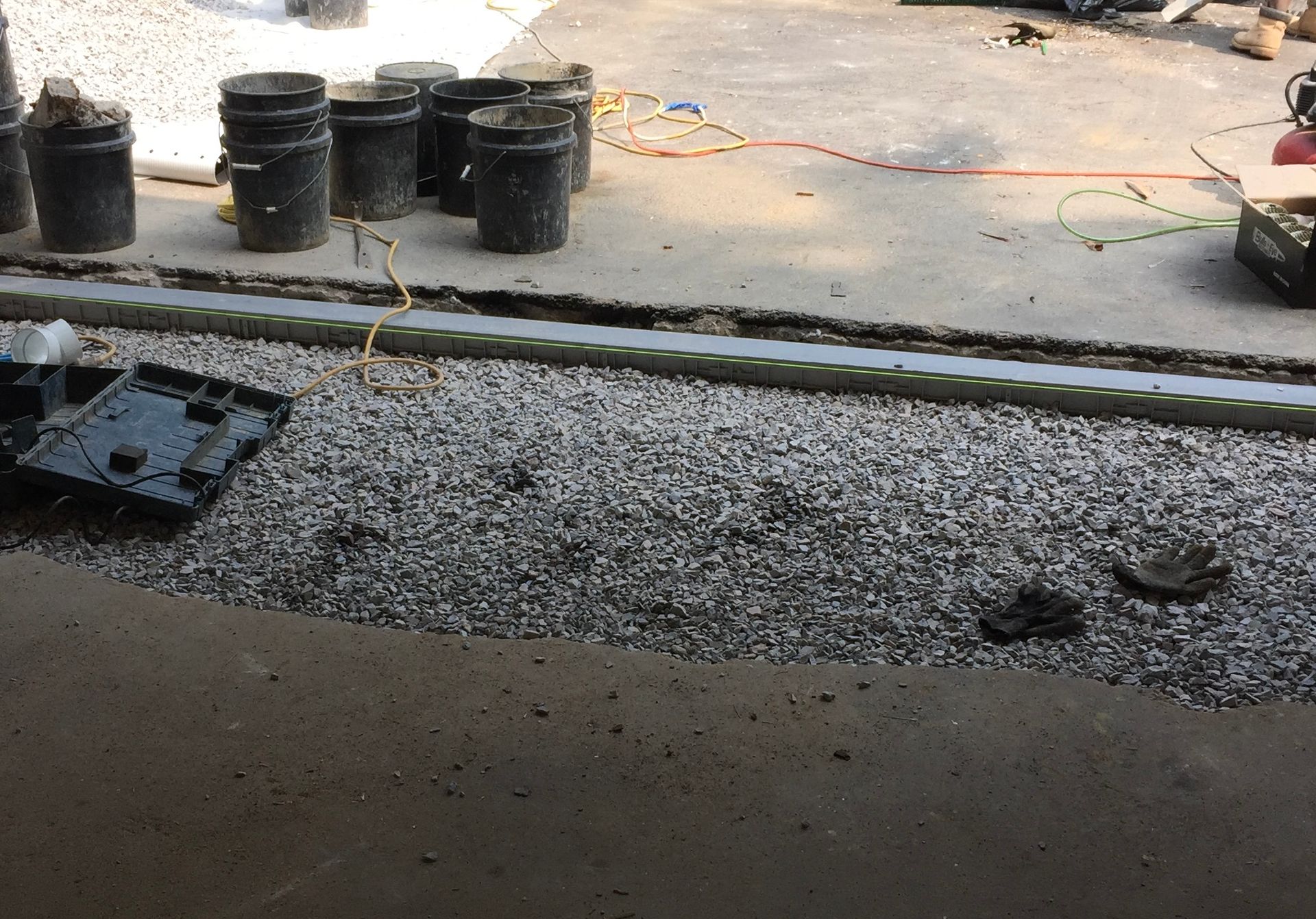 Garage threshold repair preparation by Elite Basement Solutions