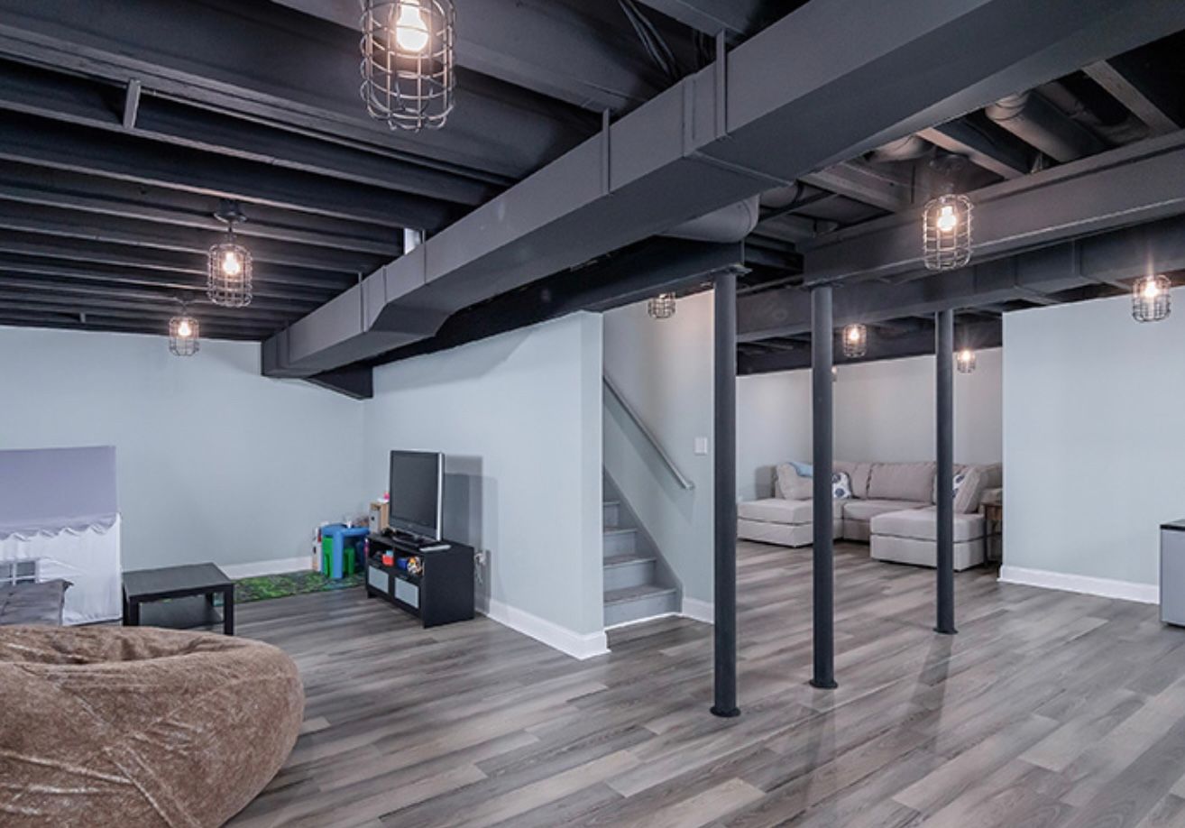 Painted basement rafters by Elite Basement Solutions