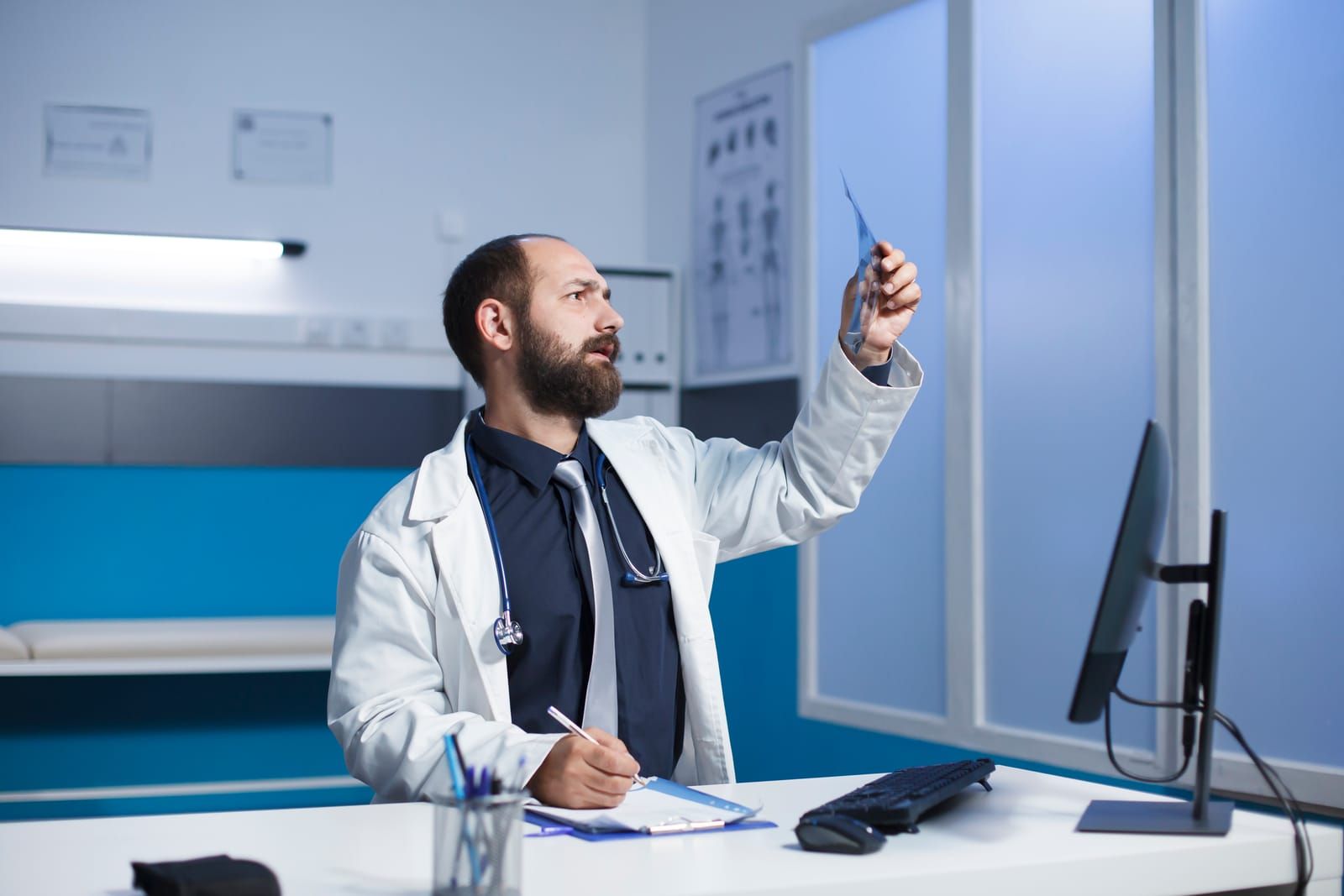 A doctor checking sinus CT scan