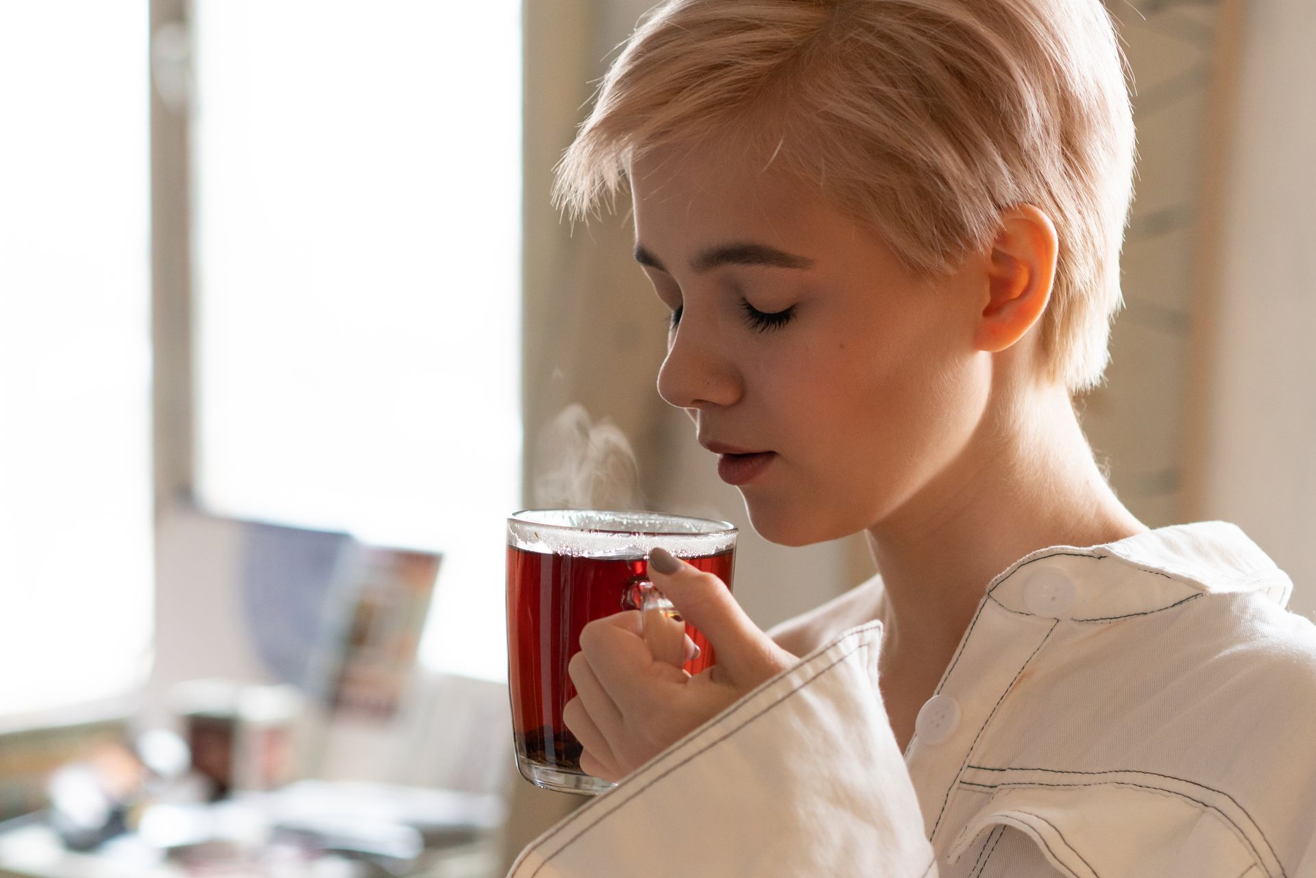 woman drinking tea to hydrate