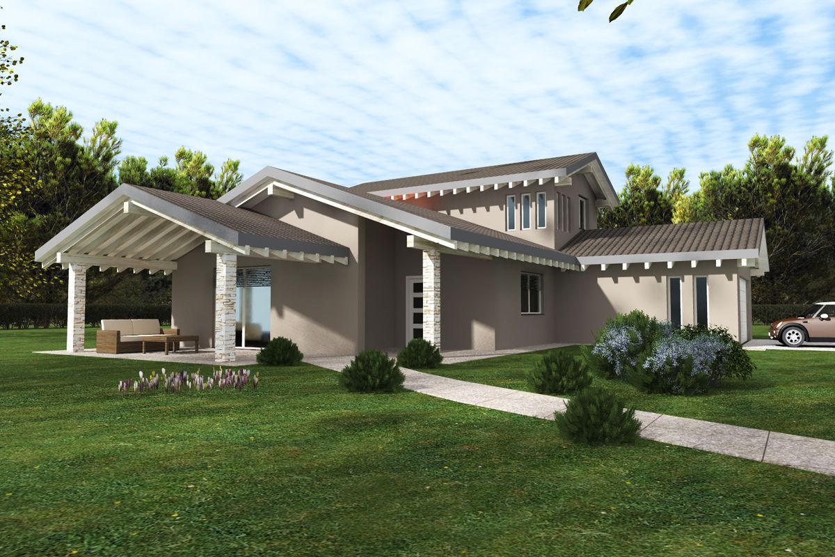 Casa moderna con veranda coperta, ampie finestre e prato verde sotto un cielo parzialmente nuvoloso.