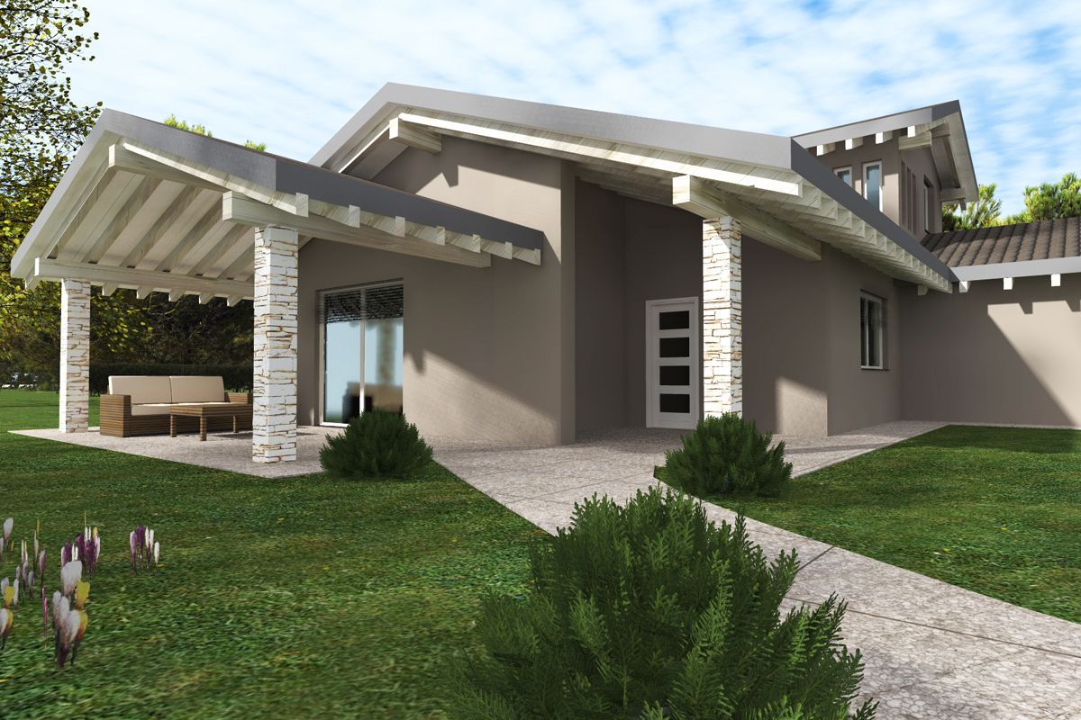 Casa moderna color beige con dettagli in pietra, tetto spiovente e un prato verde sotto un cielo azzurro.