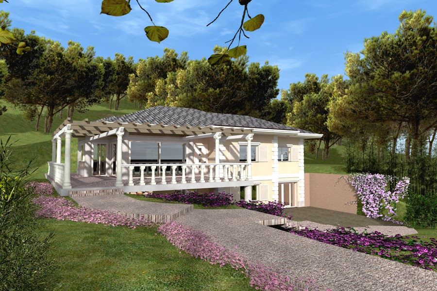 Casa bianca con portico e vialetto d'accesso, circondata da vegetazione e fiori viola.