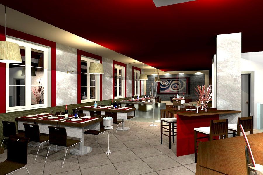 Elegante interno di ristorante moderno con soffitto rosso, tavoli, sedie e opere d'arte astratte alle pareti.