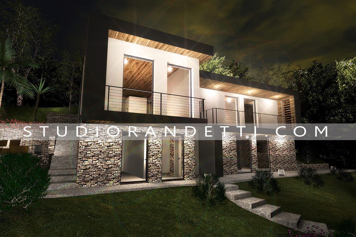 Casa moderna a due piani in pietra e legno di notte, con calda illuminazione esterna e giardino paesaggistico.