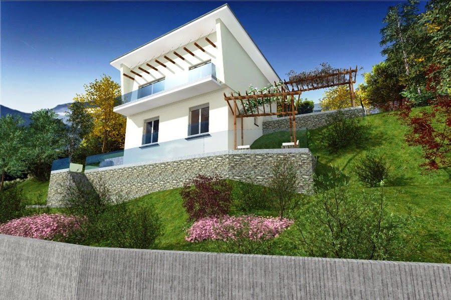 Casa moderna bianca con tetto spiovente su un pendio erboso sotto un cielo azzurro