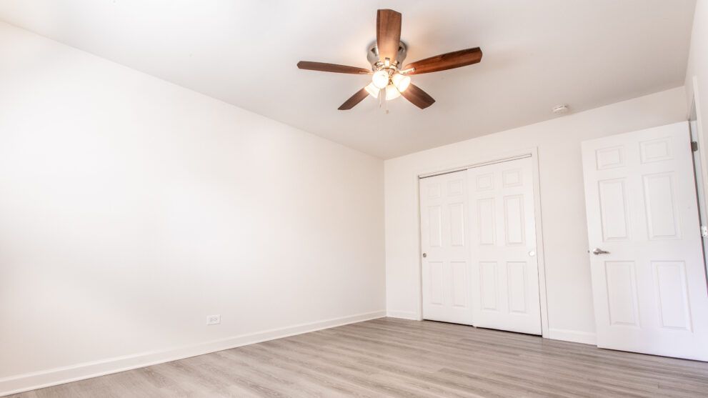 Photo of room with ceiling fan alternate angle