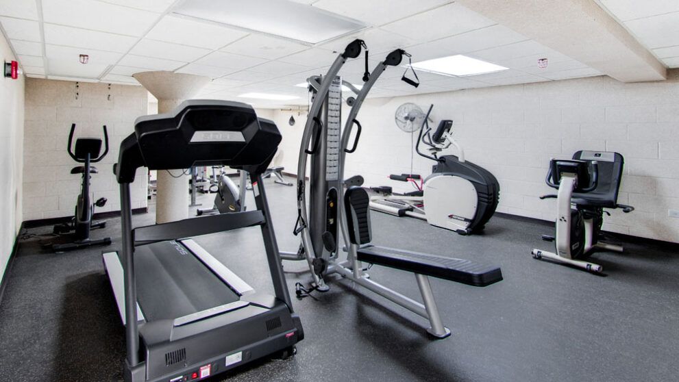 photo showing fitness center with various equipment