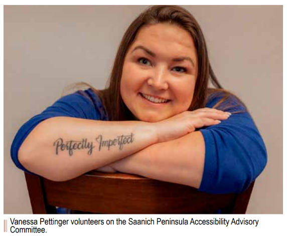 Click to download full PDF article. Vanessa is sitting with her arms crossed over the back of a chair. The tattoo on her arm reads
