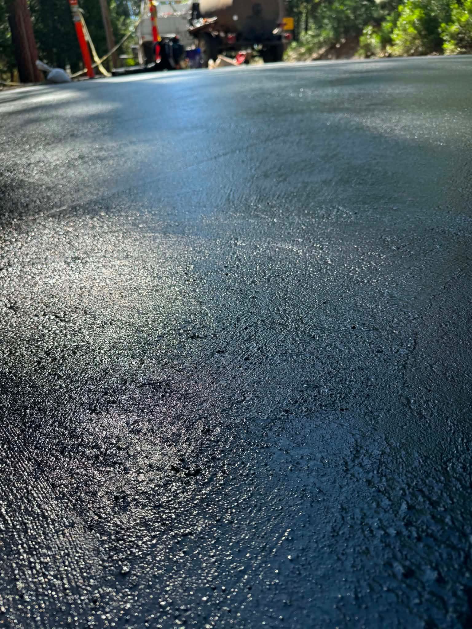Seal Coating some old Asphalt and bringing this Sonora Residents driveway back to life! By T-N-T Paving & Excavating.