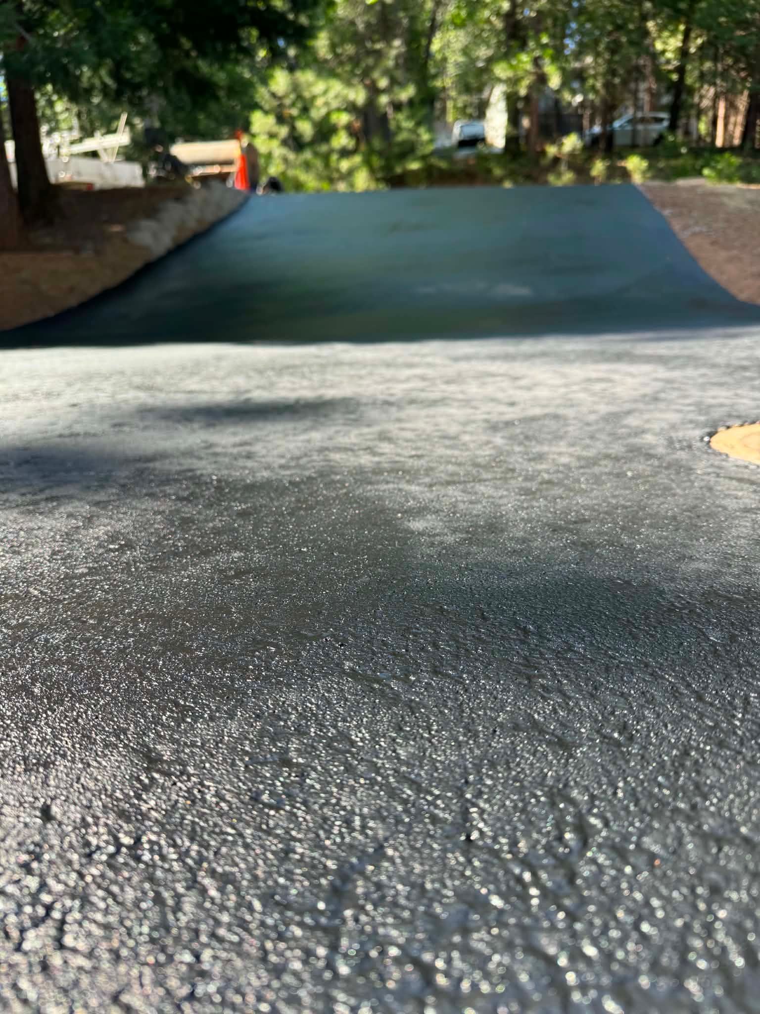 Another Beautiful Seal Coating Residential Driveway in Sonora CA, done by T-N-T Paving & Excavating.