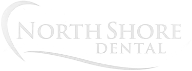 North Shore Dental logo in light gray text with a crescent moon graphic