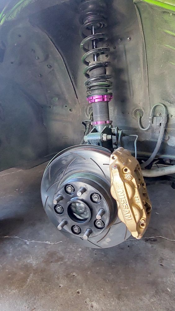 A Close up Of a Car with A Brake and Suspension — Wilkomotive Mechanical in Bentley Park, QLD