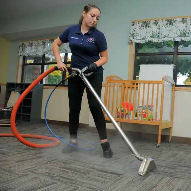 Blas Carpet employee is steam cleaning home carpeting in Atlanta, Georgia.
