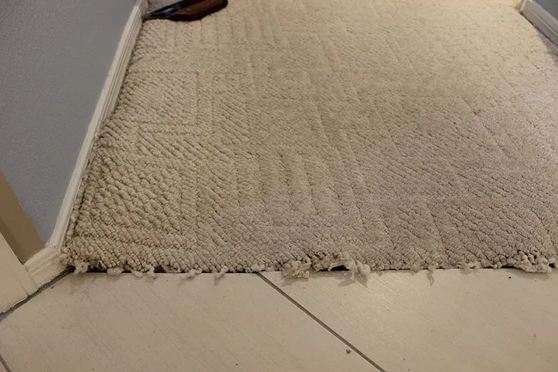 Before carpet repair service in Atlanta, Georgia.