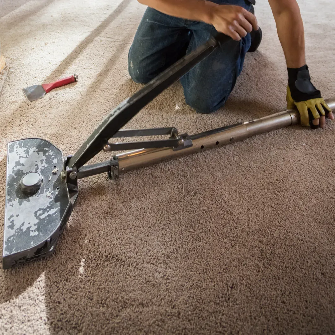 Blas Carpet specialist laying new carpet down in Atlanta, Georgia home.