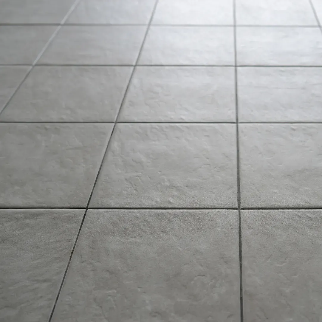 Unglazed ceramic tile flooring installation service.