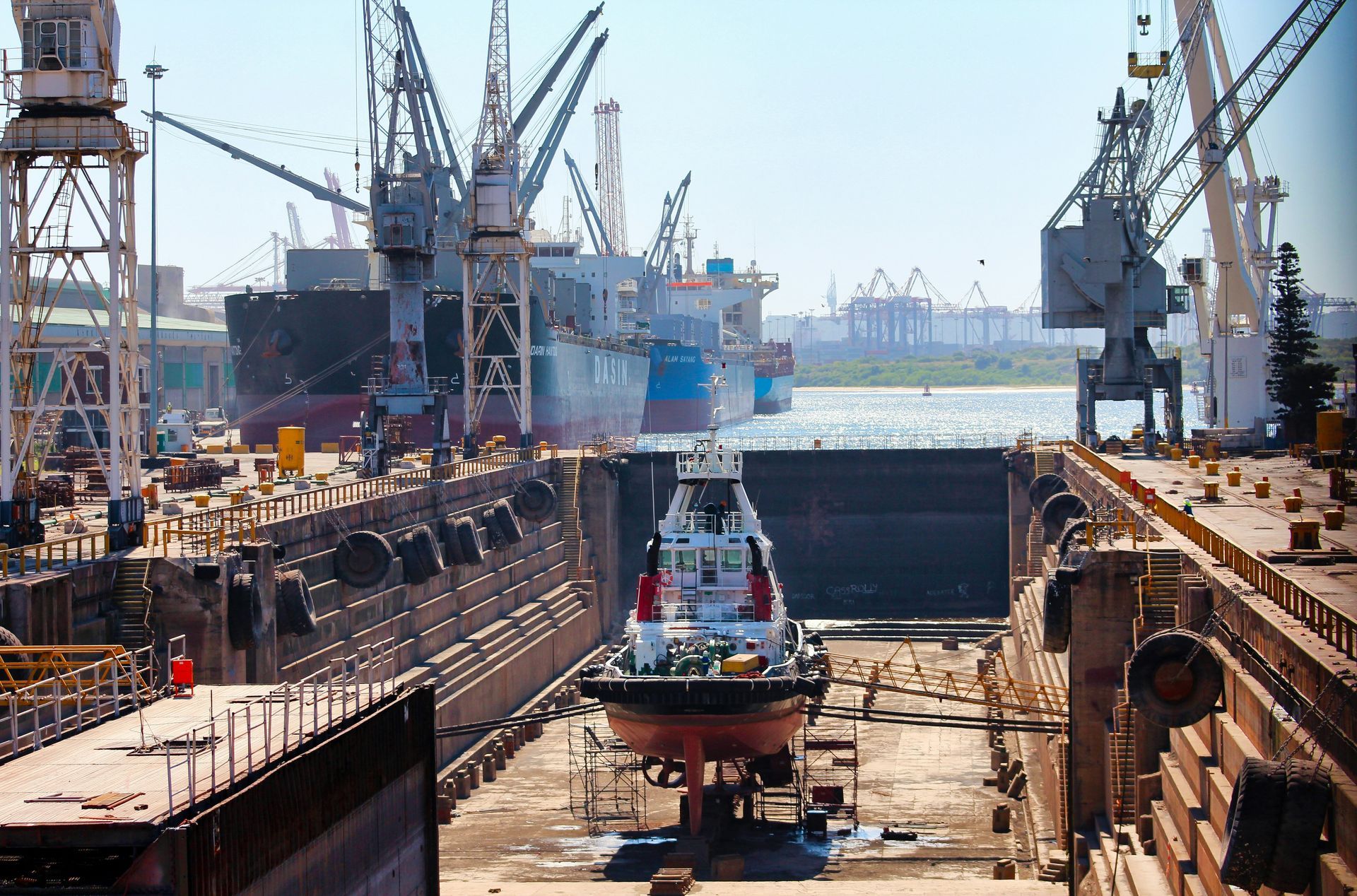 A large ship is being built in a shipyard.
