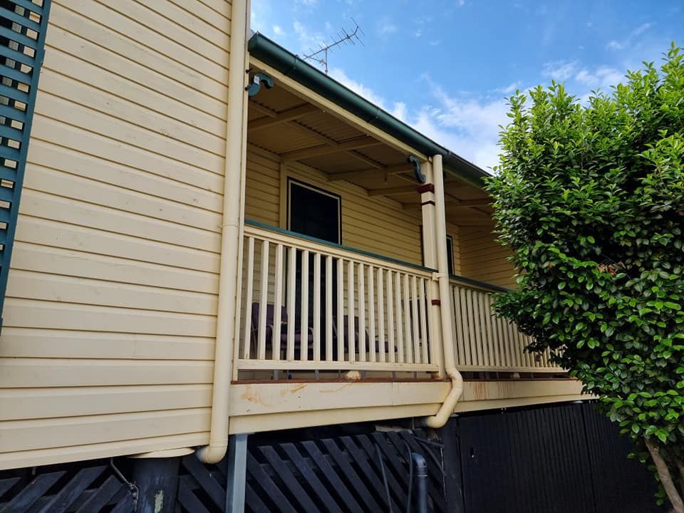 A House With A Porch And A Tree In Front Of It — LMS Painting & Maintenance Pty Ltd In North Lambton, NSW