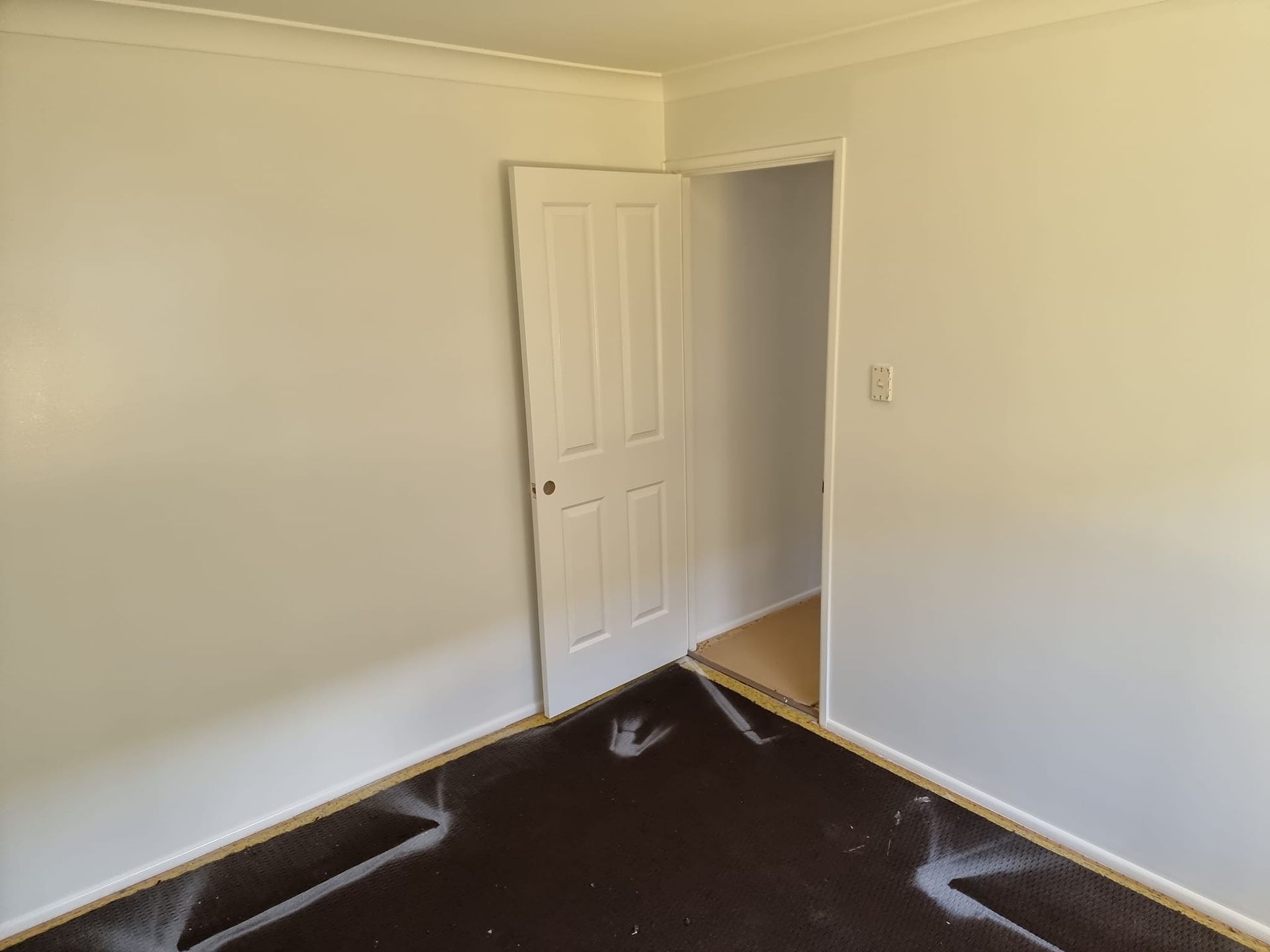 There Is A Door In The Corner Of The Room — LMS Painting & Maintenance Pty Ltd In Maitland, NSW
