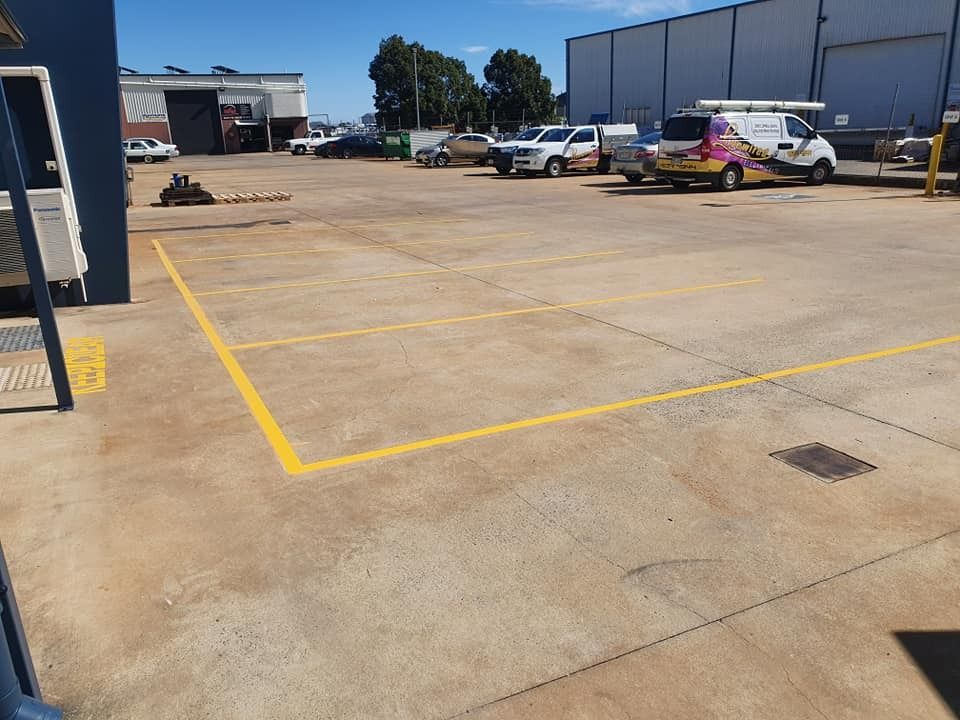 A Parking Lot With A Lot Of Cars Parked In It — LMS Painting & Maintenance Pty Ltd In Singleton, NSW
