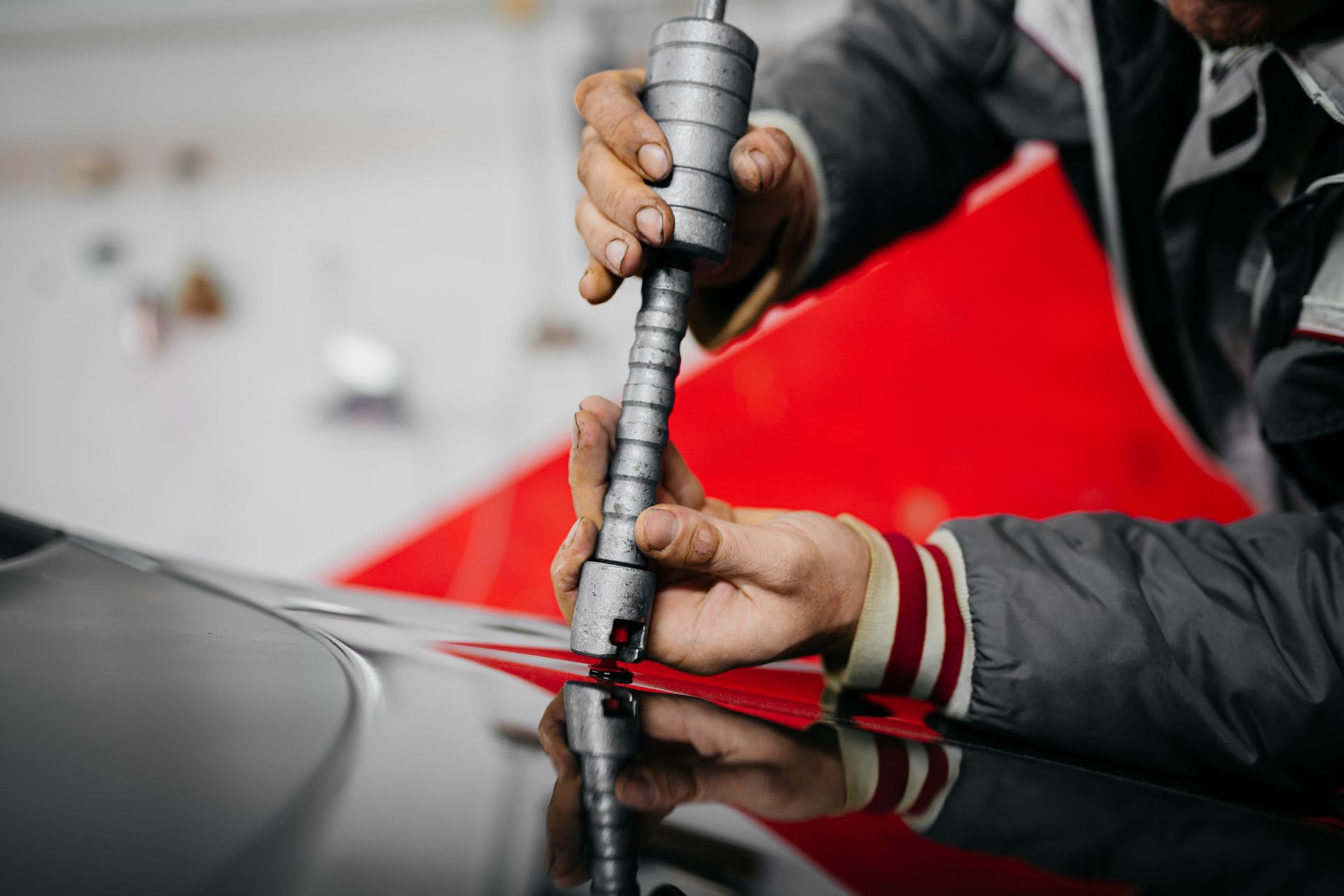 Mechanic Disassembling Damaged Vehicle — Geelong, VIC — Geelong Accident Repair